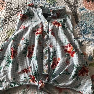 I’m selling a button up blouse